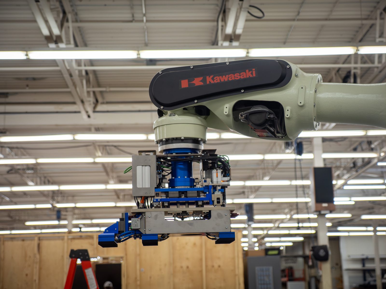 EDGE Automation Kawasaki robotic palletizing arm on the plant floor
